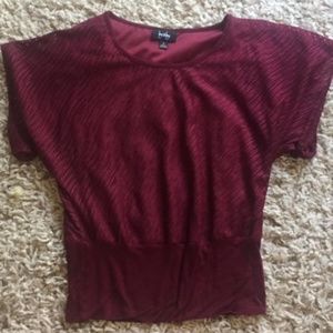 Maroon short sleeved textured blouse. Worn once.